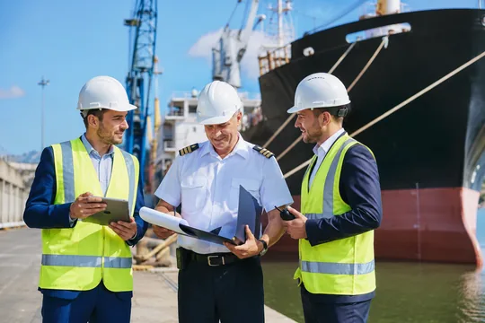 Representative image of shipboard and shore-side port-call coordination.